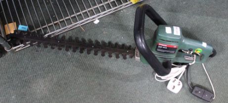 An electric Bosch PHS 46 G hedge trimmer