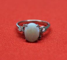 An 18k white gold Opal set ring, gross weight 3g