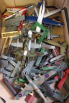 A box containing a wide selection of vintage die-cast model planes, railway stock etc