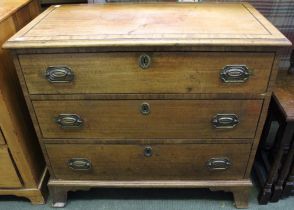 A 19th century three drawer mahogany chest on bracket feet of small proportions