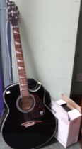 A Lindo electro acoustic guitar in carry case