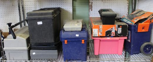 A shelf containing a large selection of tools & tool boxes