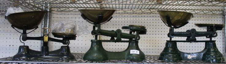 Three various green painted kitchen pan scales with weights