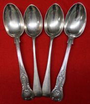 A pair of Edwardian silver dessert spoons, Hanovarian pattern, London 1904 and a pair of Kings patte