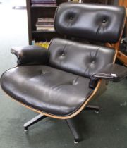 An Eames lounge chair, on five point swivel base, considered to be second generation