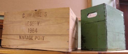 A vintage wooden green painted six bottle crate