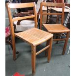 Three vintage stacking wooden school chairs