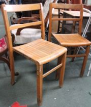 Three vintage stacking wooden school chairs