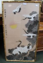 A Japanese inspired print of cranes, in gilt faux bamboo frame