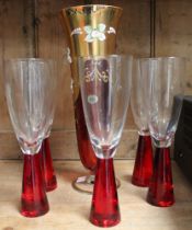 A set of five vintage red bottomed glasses together with a Bohemia crystal red & gold vase