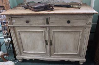 A painted pine two drawer sideboard with pine planked top