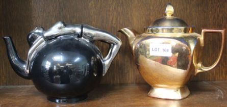 An Art Deco design ceramic teapot, having silver lustre lady draped over the top, together with a gi