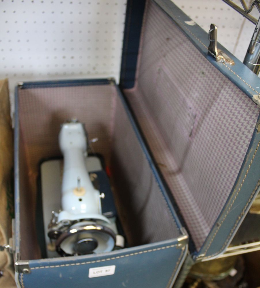 A Jones hand operated sewing machine in blue carry case - Image 2 of 2