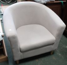 A modern grey upholstered tub chair