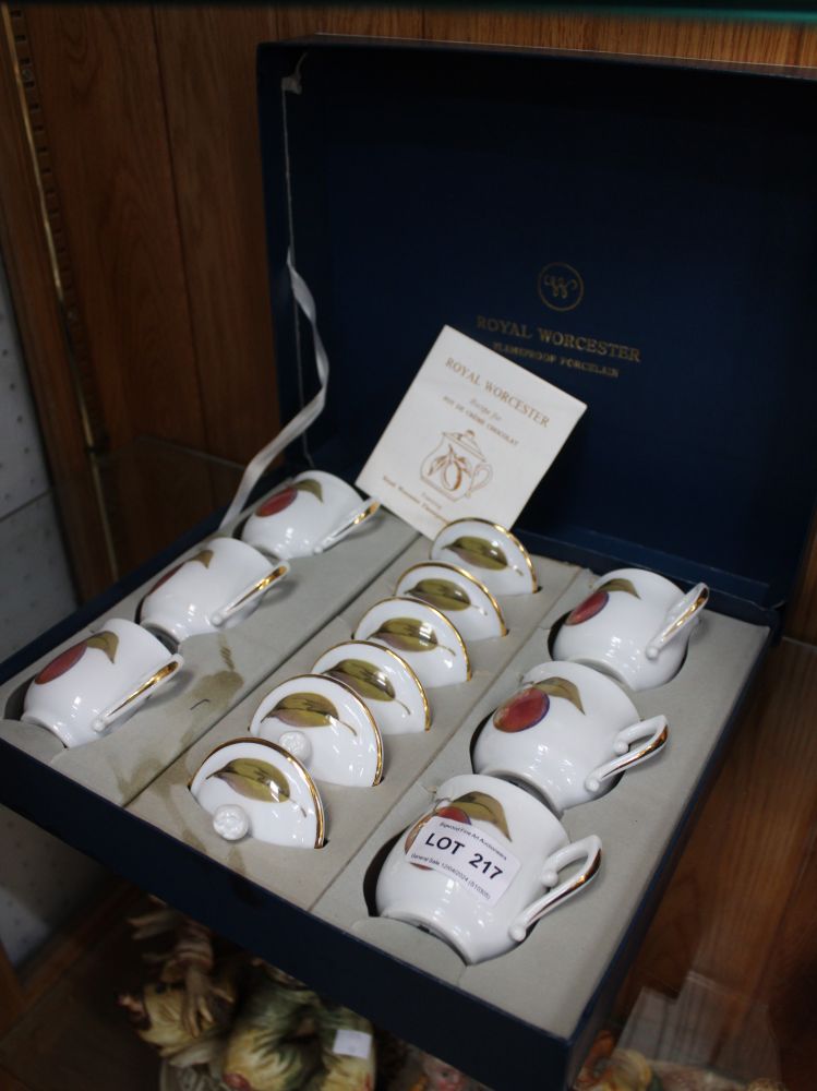 An Royal Worcester flame proof porcelain set of 6 'Pot de Creme Chocolat' cups with lids in the Eves