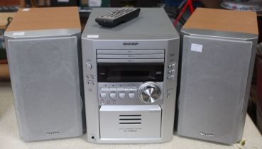 A Sharp XL-HP600 Micro Component System Hi-Fi with speakers