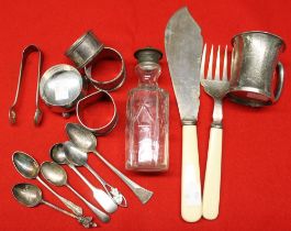 A small silver tankard, 3 napkin rings, silver spoon, silver salt, and plated wares