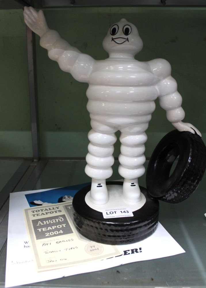 A "Totally Teapots ceramic limited edition "Totally Tyres" teapot in the form of the "Bibendum" man,