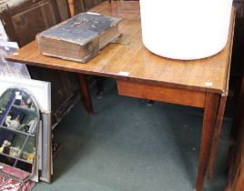 A 19th century oak drop leaf table of typical form & construction