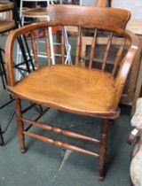 A bow back Windsor armchair single spindle comb, ash and elm