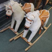 A pair of cream cord Rocking Horses
