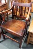 A 19th century solid seated mahogany carver chair