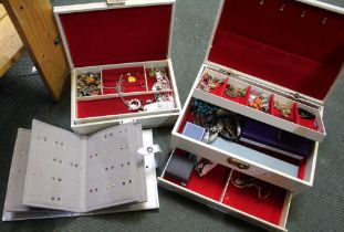 A good selection of costume jewellery, housed in two boxes, & an earring book