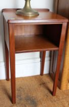 A pair of teak bedside mid century cabinets