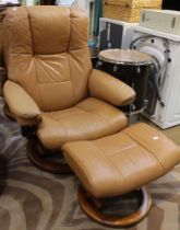 A leather Stressless reclining Chair on wooden frame and matching footstool