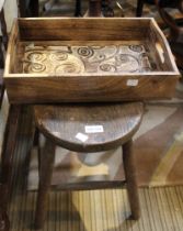 A small stool together with a highly carved tray