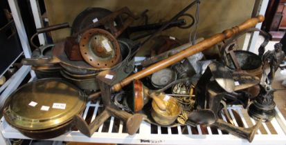 A shelf full of metal wares to include shoe lasts, saucepans, copper kettle etc