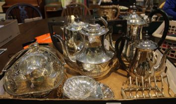 A collection of silver plated items to include bottle-holder, coffee pots, teapots, etc
