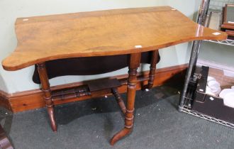 A walnut Sutherland style gate leg table