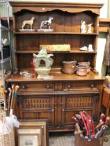 An Old Charm style dark wood dresser