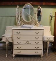 A cream and gilt 20th century chest of five drawers with associated headboard and bedside tables