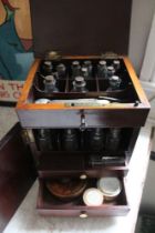 A 19th century mahogany apothecary case with contents