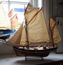 A wooden model sailing ship