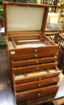 A six drawer wooden dentist/medical cabinet with hinged lid 33 x 23 x 36 cm