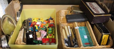 A tray box containing a wide variety of items to include cutlery, model cars etc