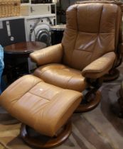 A leather Stressless reclining Chair on wooden frame and matching footstool