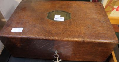 A 19th century oak work box with key, containing a selection of varied collectable items