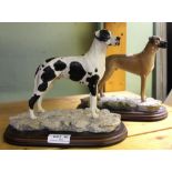 Two Best of Breed ceramic models of Great Danes on wooden plinths by Naturecraft