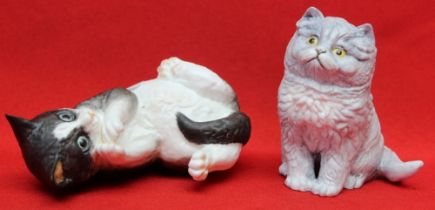 Two "Royal Worcester" ceramic kittens, a "Black and White" and a "Blue Prussian" (2)