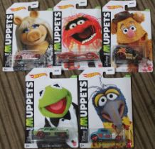 A set of five Hot Wheels Muppets character vehicles, in original blister packs (5)