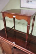 An early 20th century mahogany occasional table, with pierced tapering supports