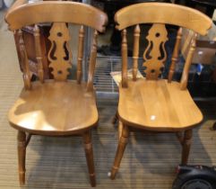 A pair of kitchen chairs