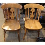 A pair of kitchen chairs