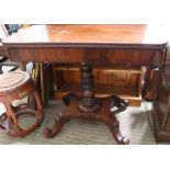 A 19th century mahogany tea table