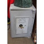 A small vintage painted safe (open but no key)