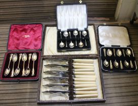 Three cases of sets of six hallmarked silver coffee spoons, three different designs,combined silver